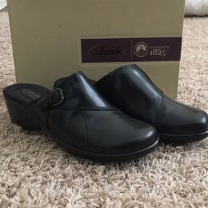 Clark’s woman’s slip on shoes , black leather, new